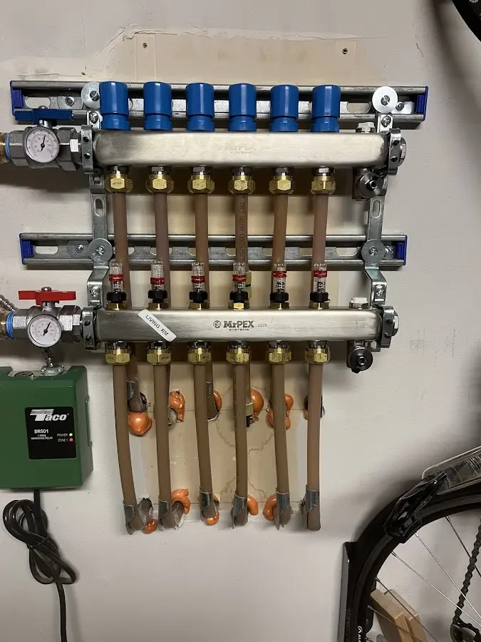 Plumber performing Gas Line Installation at a residential property in Pepperell